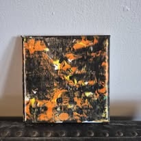 Orange, yellow, and black pour