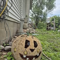 Smiling pumpkin garden stone