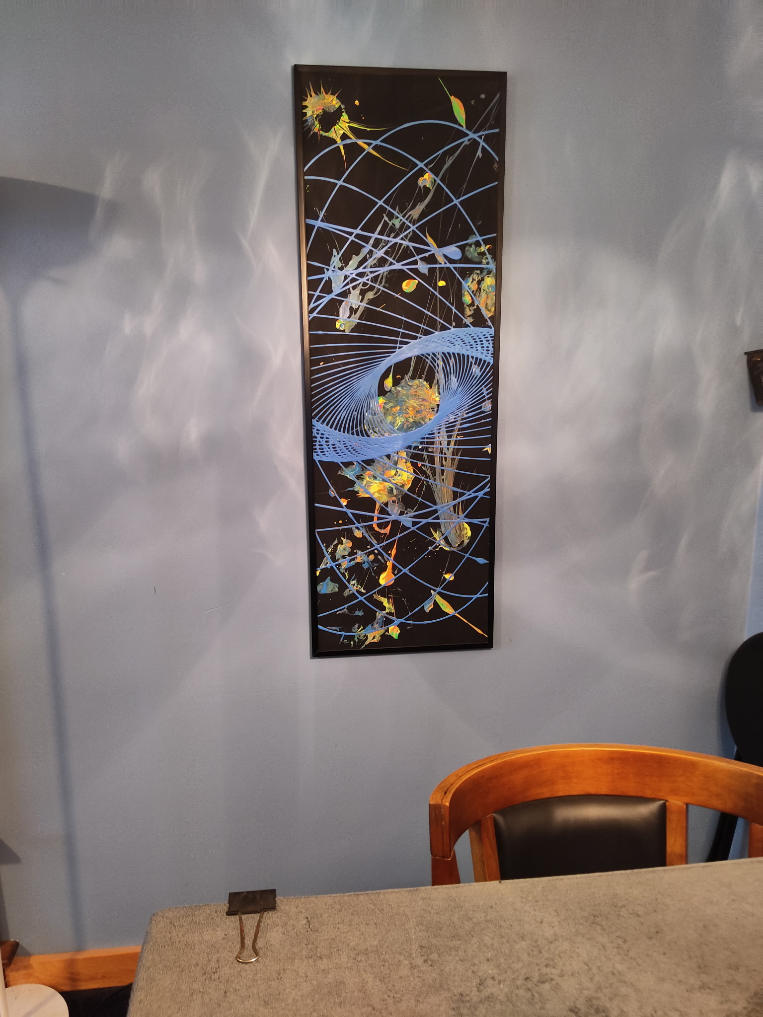 Galexy Far painting framed on the wall